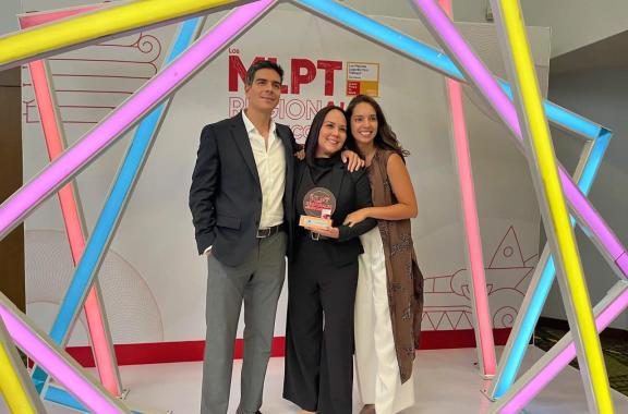 Employees in Mexico holding a Great Place to Work Award