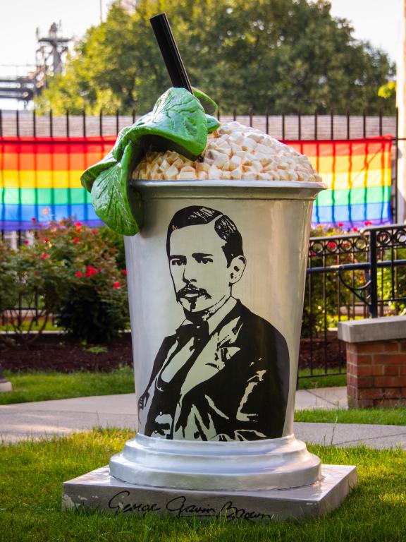 Mint Julep Statue with PRIDE Flag in Background