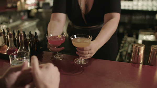 Bartender serving drinks