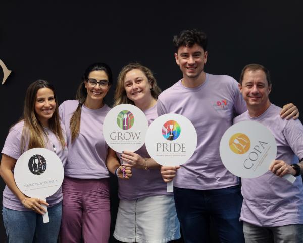 Brazil Employees Holding ERG Signs